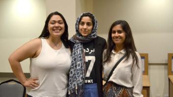 Three students posing for a picture