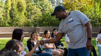 UC Davis College Corps students outdoors with advisor