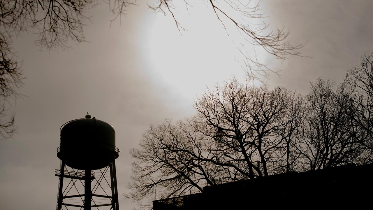 (Gregory Urquiaga/UC Davis) Water tower on cold day.