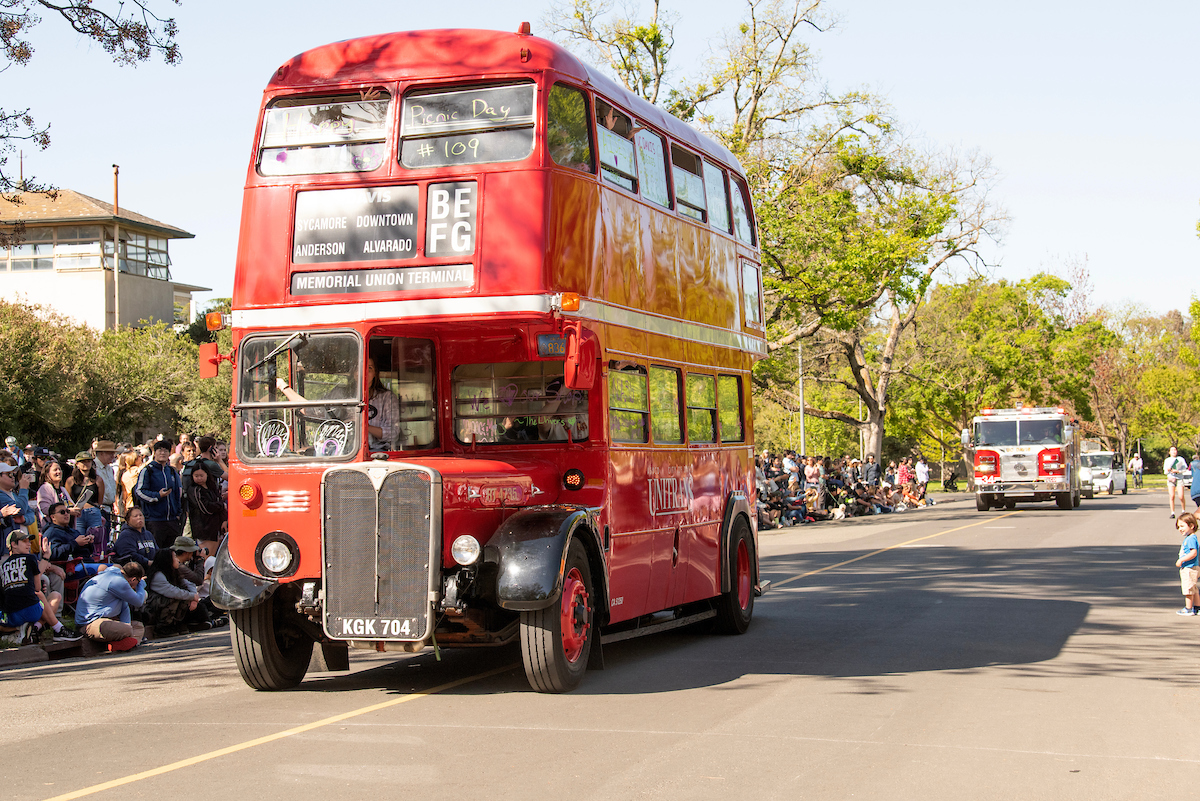 A Unitrans double decker bus drives the parade, 2023