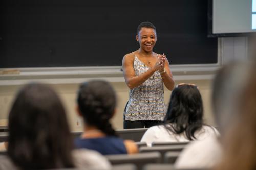 a speaker stands in front of a class in a lecture hall to talk about EOP